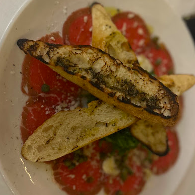 Acqua Di Mare signature dishes Beef Carpaccio
Spaghetti Carbonara
Sacchetti Porcini & Truffle